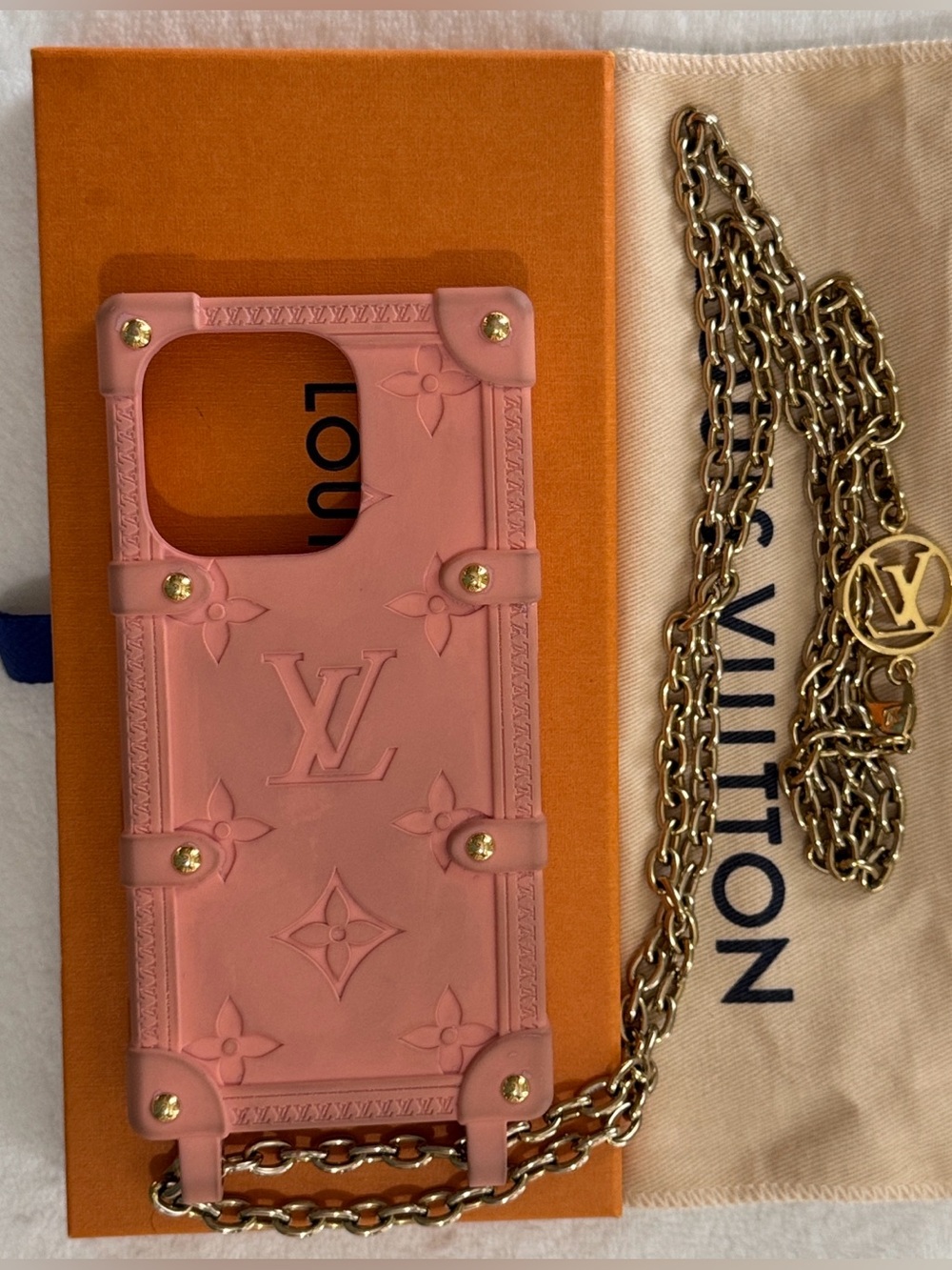 Louis Vuitton Re-Trunk iPhone 14 Pro Phone
Case | Pink | Gold Chain | Used💗✨